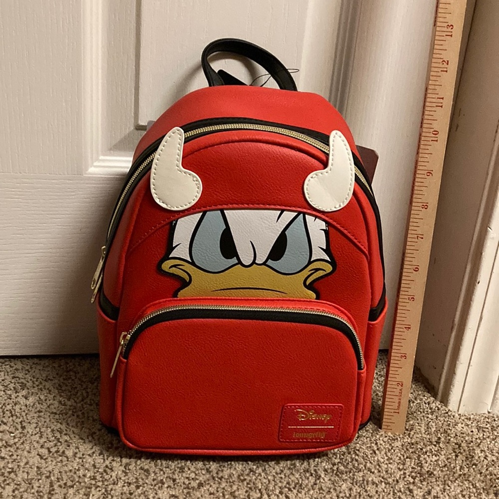 Loungefly Disney mini backpack Devil glow in the dark horns Donald Duck NWT LE